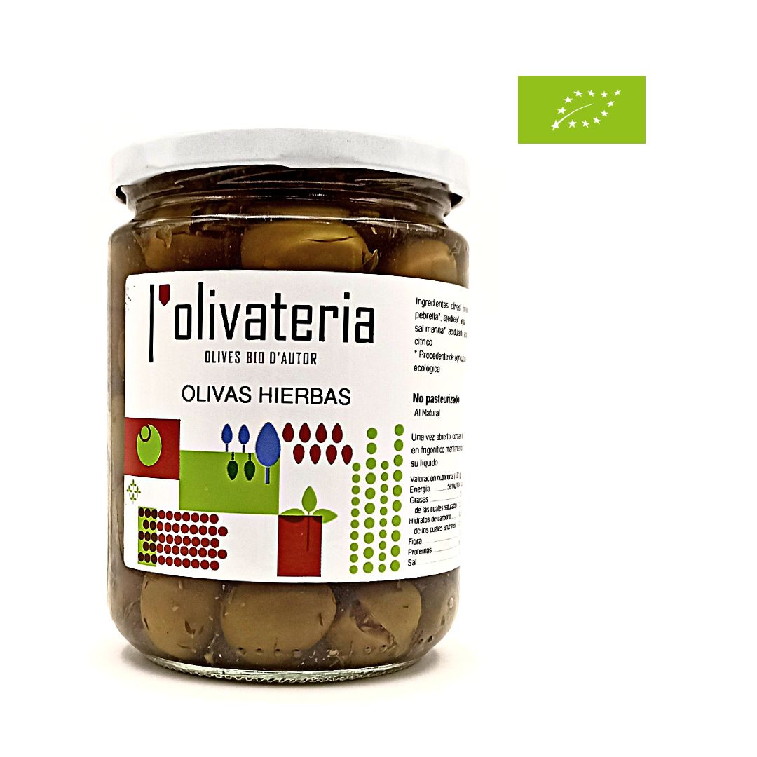 En la imatge es veu un pot de vidre ple d' Olives condimentades amb herbes mediterrànies ECO . L'envàs és de 420ml i conté uns 225 grams de producte
